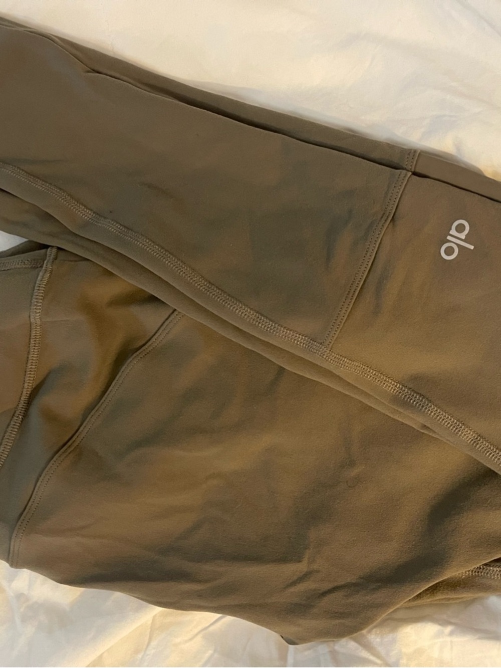 ALO Yoga Olive Green leggings with cargo style pockets